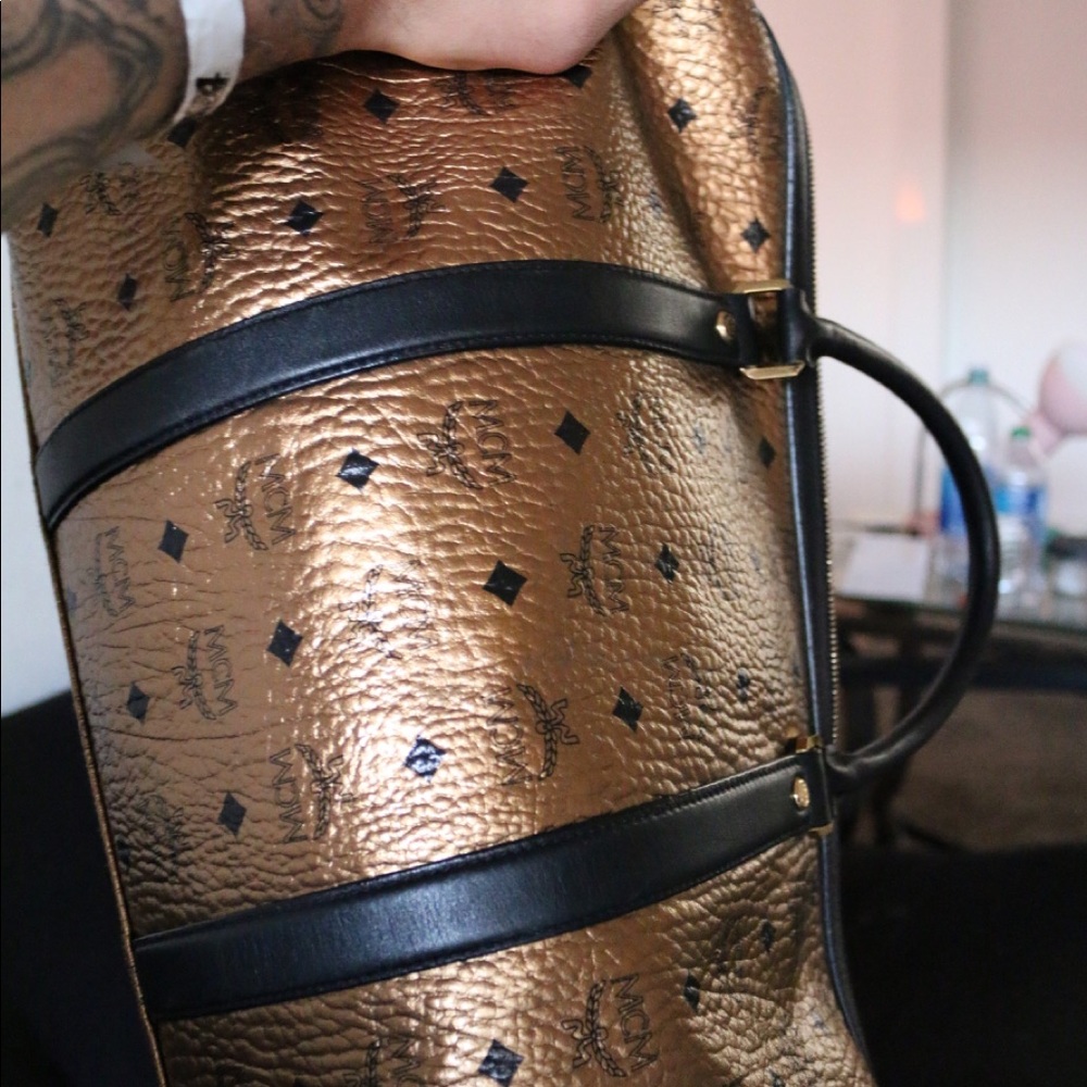 Gold MCM duffel bag. Big